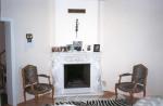 Corner style open fireplace with white marble finish - 2005